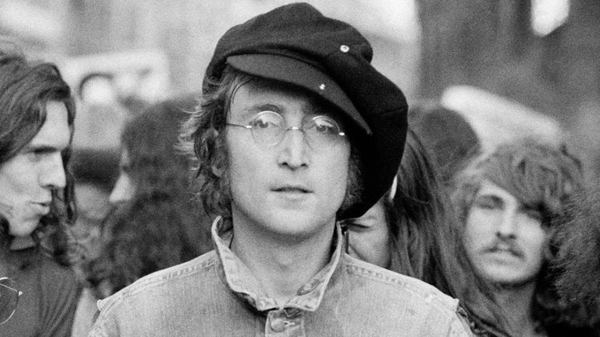 John Lennon was killed by a crazed fan outside his home in NYC