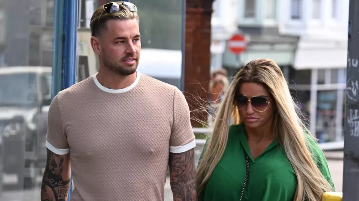 Katie Price flashes her engagement ring on a romantic getaway with Carl Woods