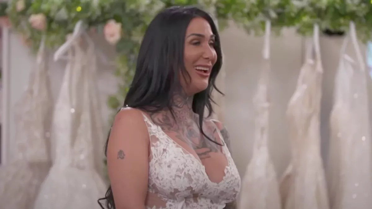 Mel loves her lacy gown.