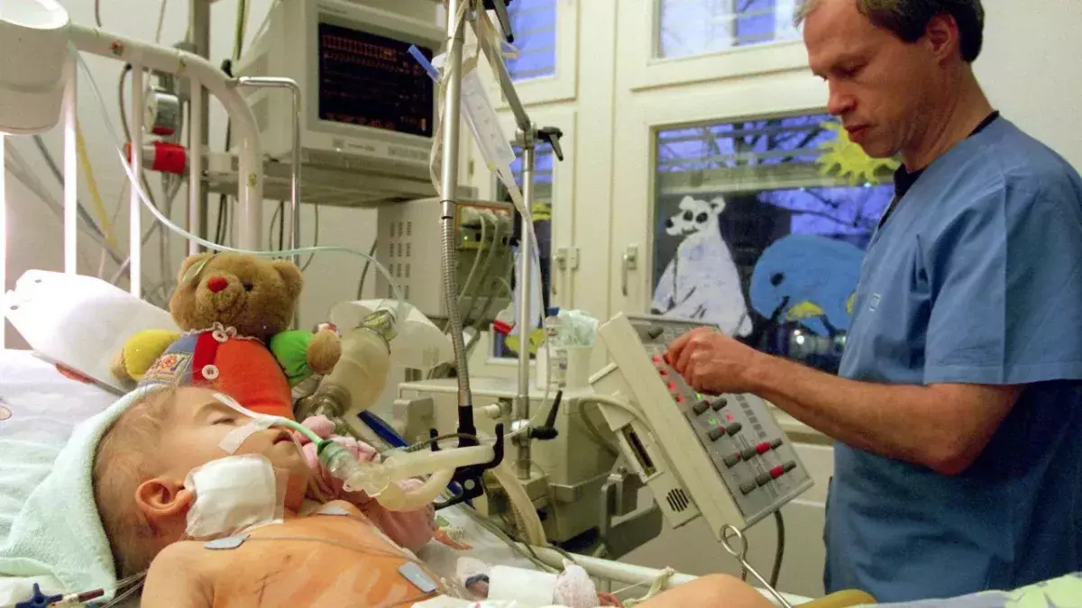 Baby diagnosed with life-threatening tumour after he stopped laughing