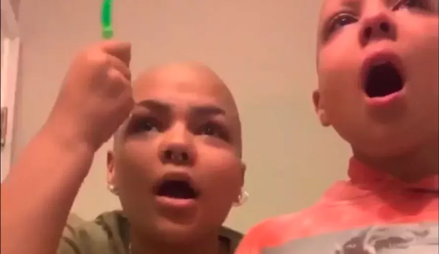 Girl shaves head