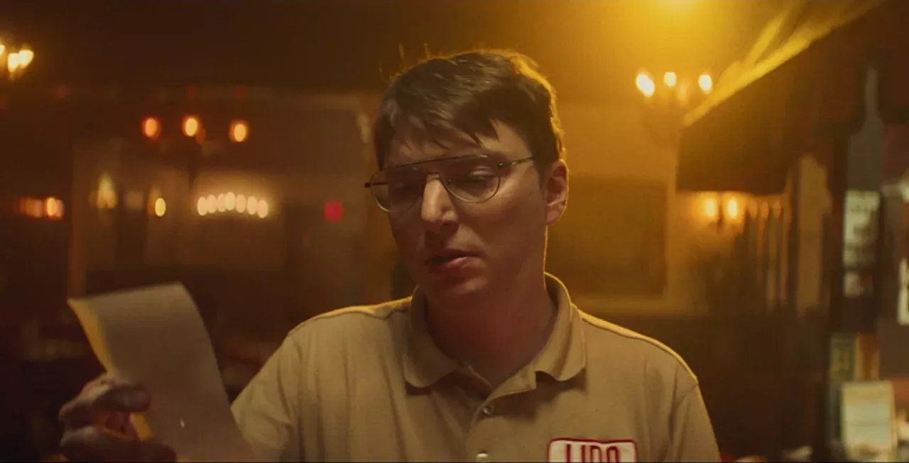 man tourist Italy restaurant bill check receipt extra charge