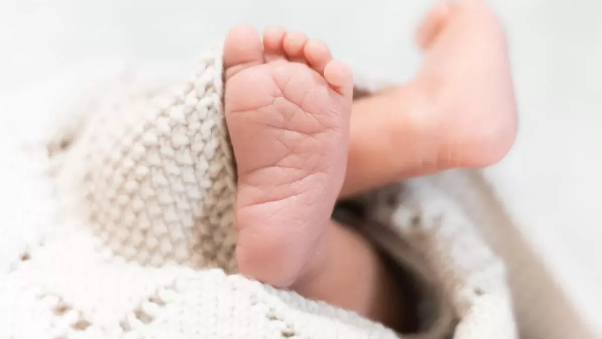 Newborn baby survives two days in the forest covered in worms and insects