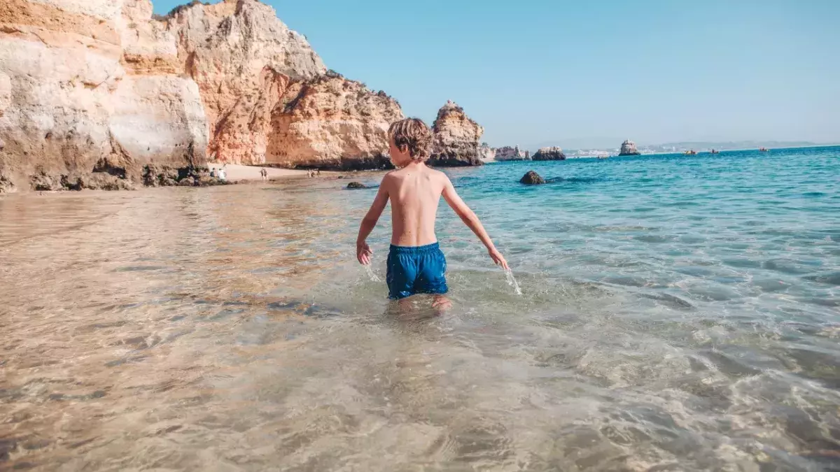 woman walking beach Maine quicksand tips tricks 