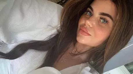 A young mother detected her own breast cancer while massaging her breasts with a moisturizing oil.