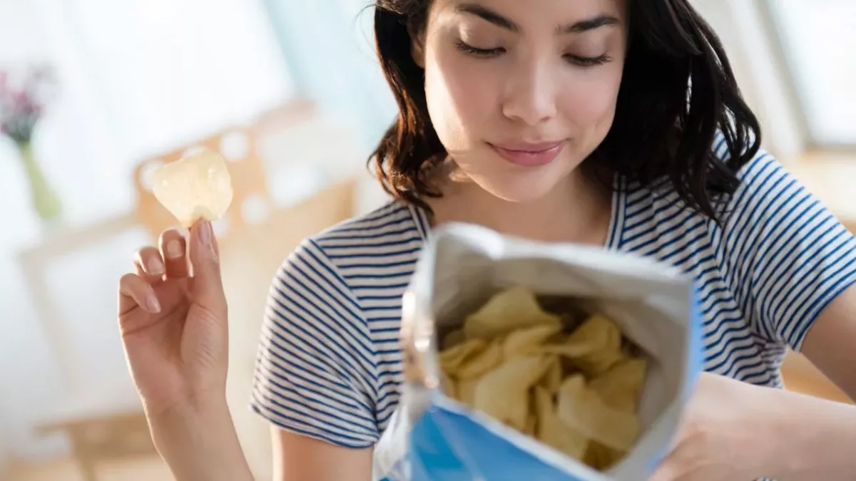 People shocked to learn the reason for empty space in crisp packets