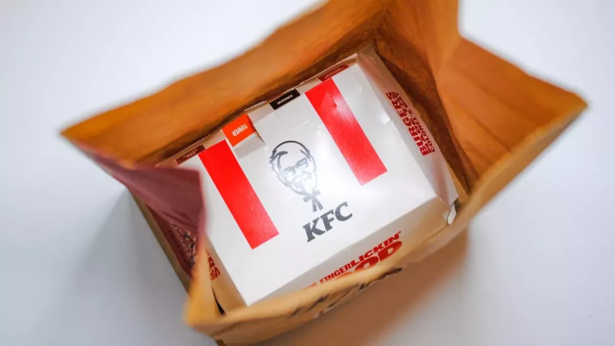 Stunned KFC customer finds a stack of cash underneath her chicken sandwich