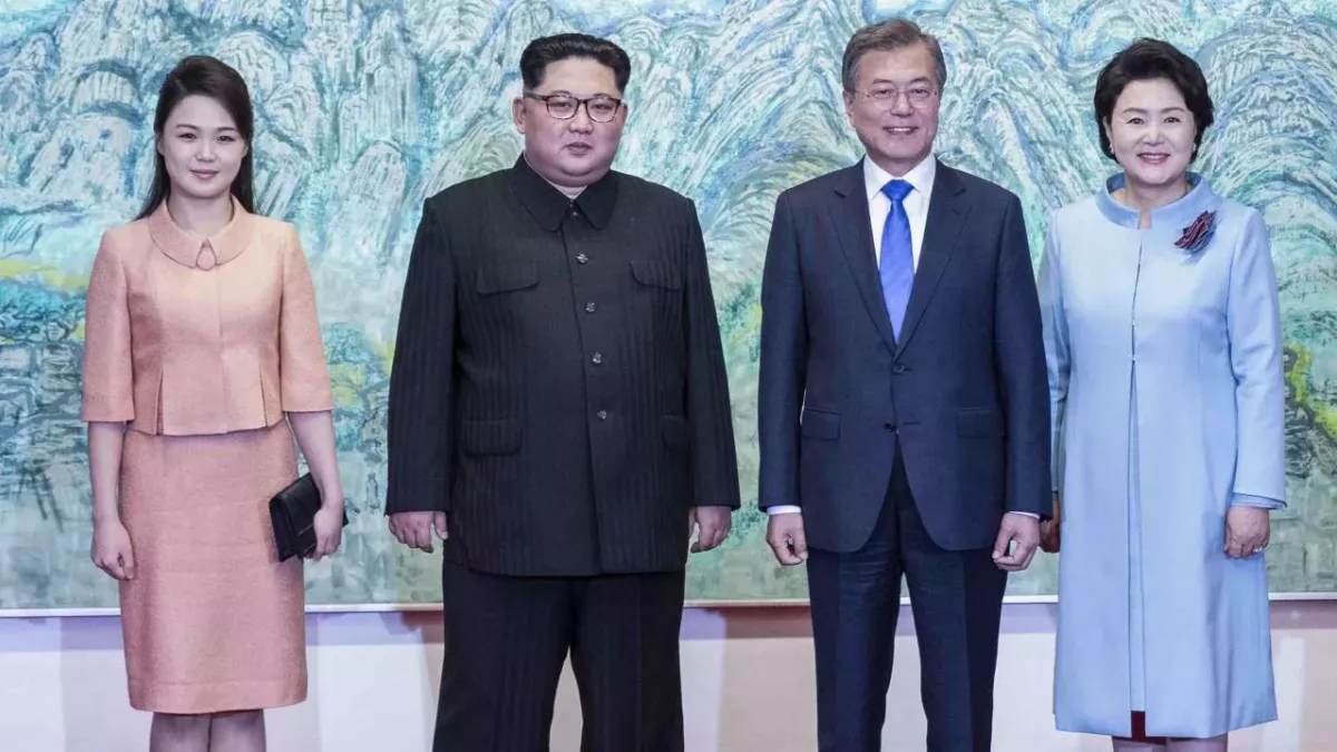 Left to right: Ri Sol-ju with her husband, Kim Jong-un (leader of North Korea), Moon Jae-in (President of South Korea), and his wife Kim Jong-sook (April 27 2018)