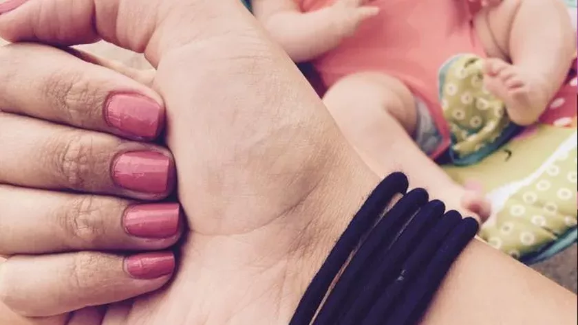 Shauna Harvey wears five elastic wristbands every day for a reason that you would never even imagine.