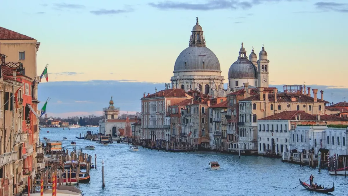 Tourists behaving badly in Venice, skinny dipping and vandalising churches