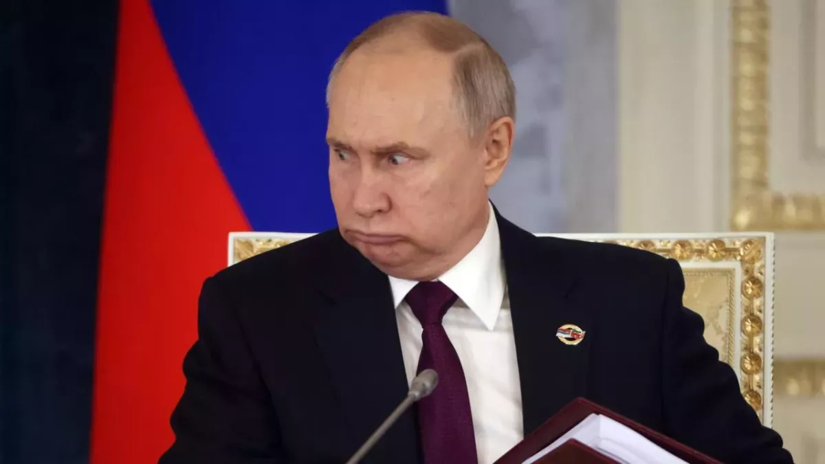 Vladimir Putin spotlight photos strange expressions