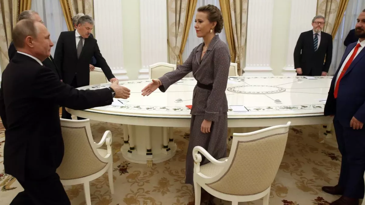 Vladimir Putin's 'goddaughter' and celebrity journalist evades arrest by fleeing abroad