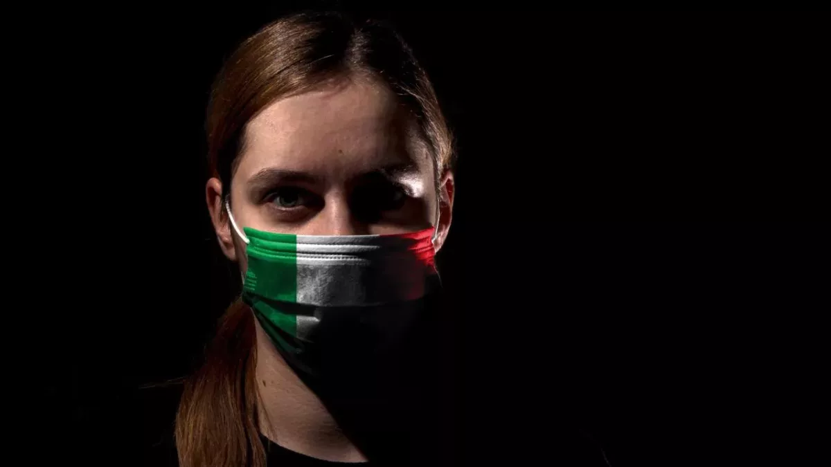 Woman with Italian colors mask