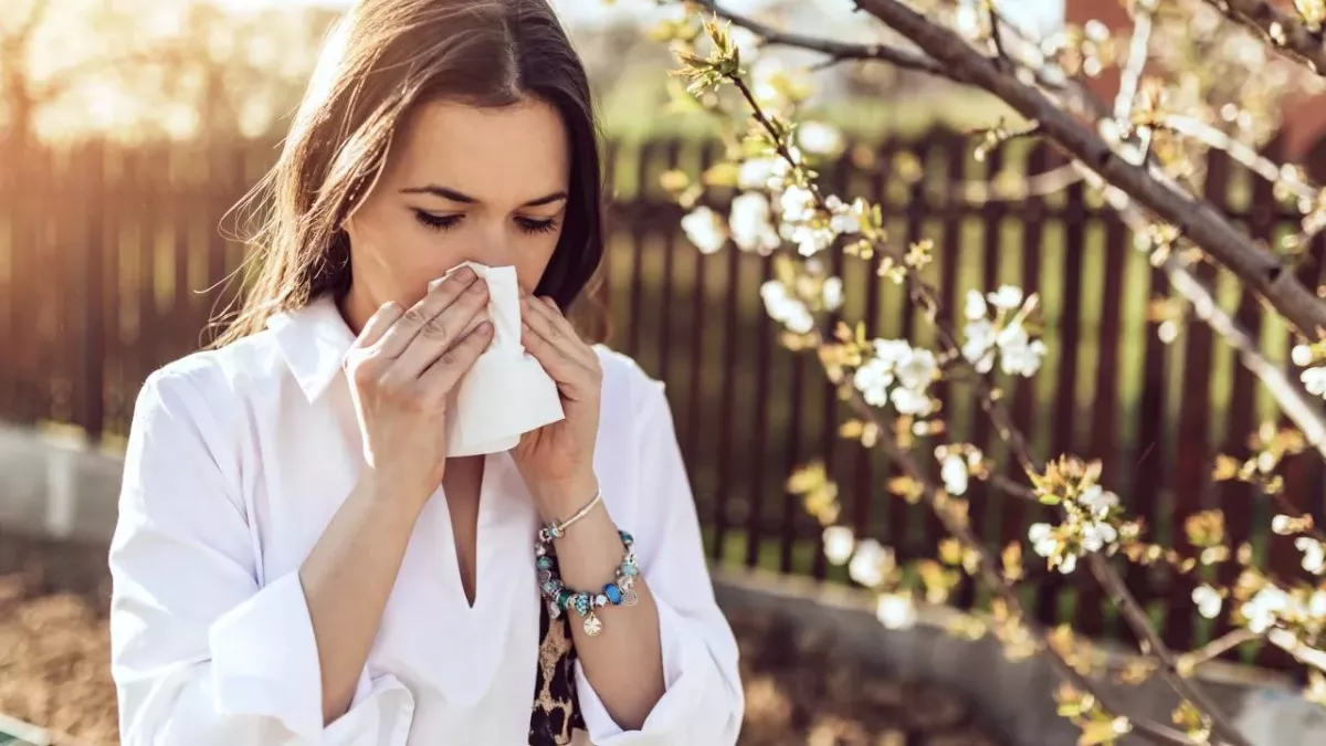 Sneezing woman