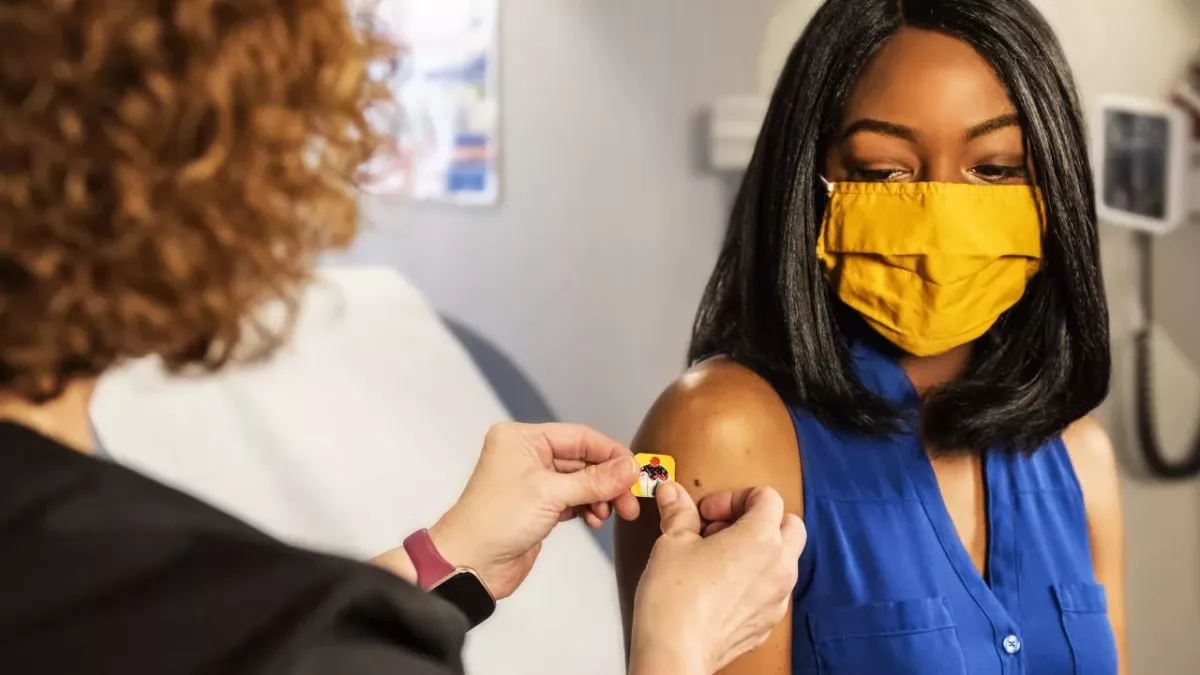 Woman getting vaccine