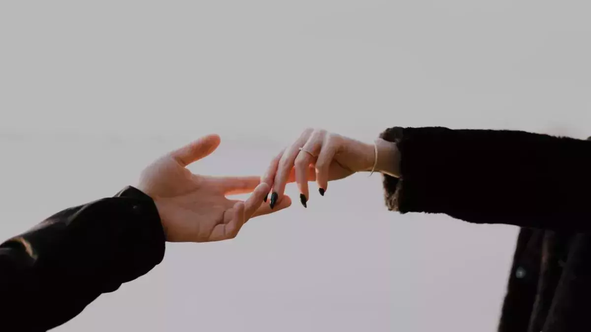 Couple holding hands