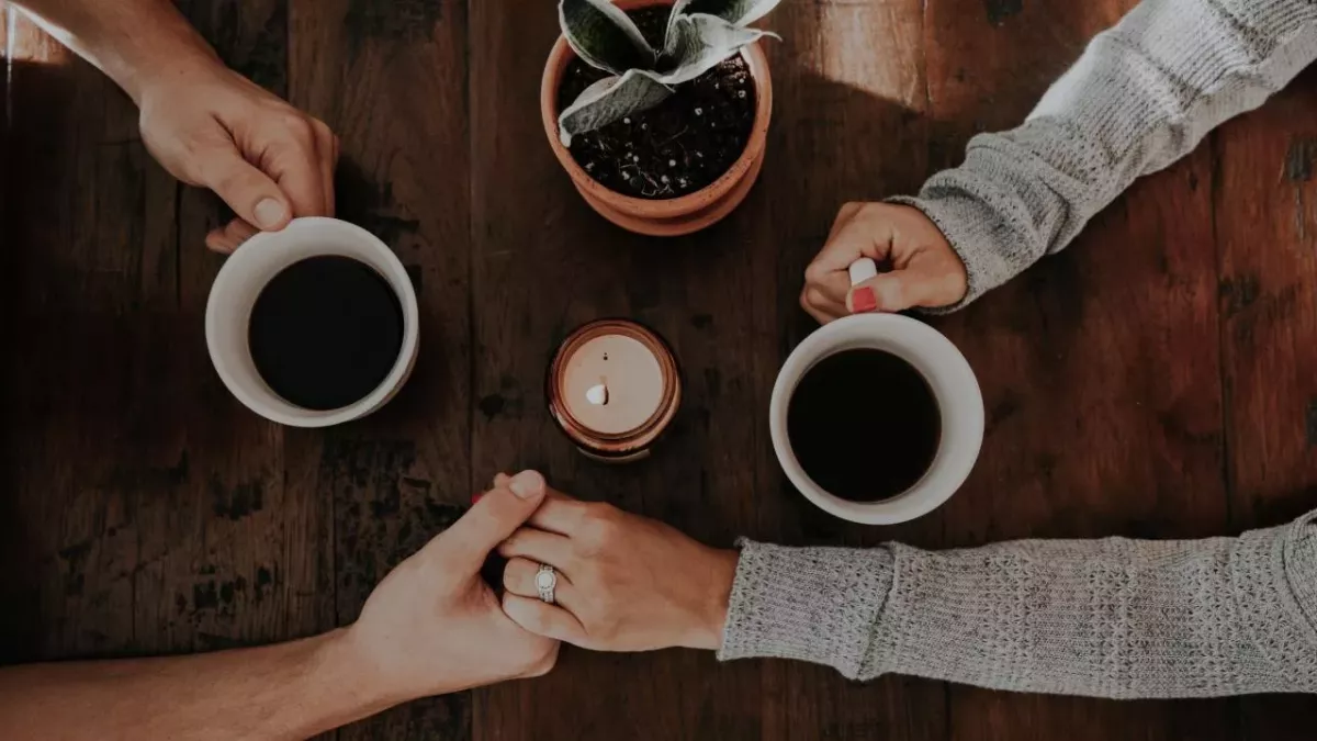 Couple holding hands
