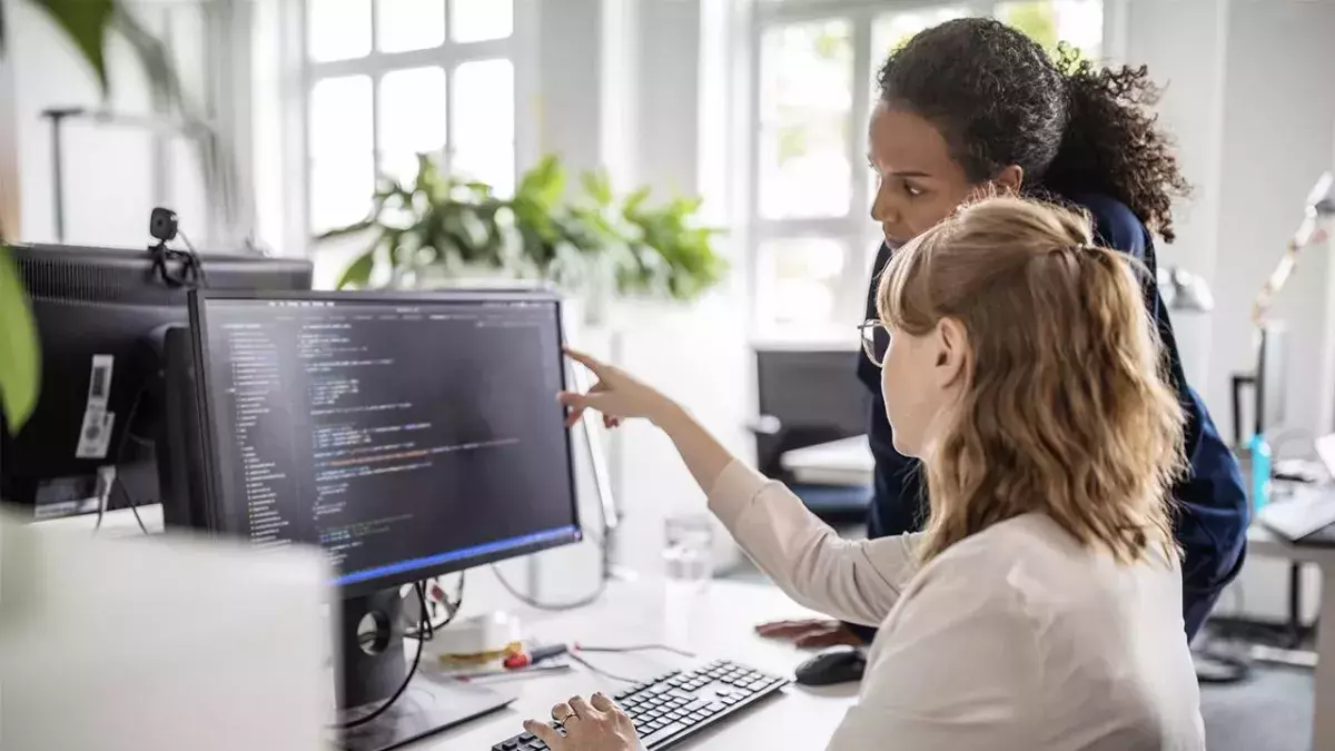 Women looking at computer screen