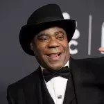 actor comedian Tracy Morgan SNL Knicks game sick escorted out wheelchair health