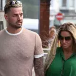 Katie Price flashes her engagement ring on a romantic getaway with Carl Woods
