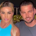 Katie Price seen without her engagement ring, after fiancé Carl Woods did this