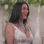Mel loves her lacy gown.