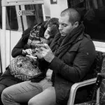 After taking photos of a bunch of strangers, he noticed something awful 