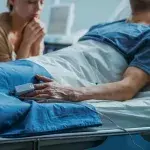 Comatose man in a hospital