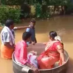 India floods: Couple sail to their wedding in a cooking pot 