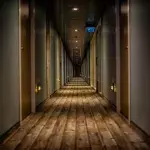 man discovers secret corridor hotel room strange