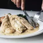 This woman eats undercooked fish and has her legs and arms amputated