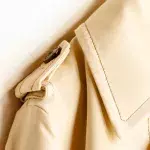 This Is What Those Buttons On Your Coat’s Shoulders Are Actually For