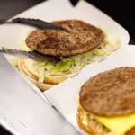 McDonald's customers shocked by behind the scene video of employee handling the grill 