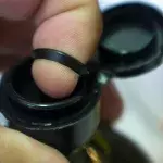 People shocked to learn the actual use for plastic pull tab on oil bottles