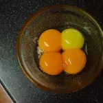 Which is healthier, the orange or yellow egg yolk?