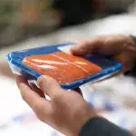 Woman left horrified after finding a wriggling worm inside her salmon filets