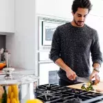 You could get sick if you do not clean this part of your kitchen, and it's not the trash 