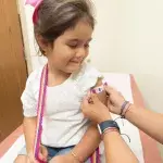 Children may be receiving COVID vaccine as early as August 