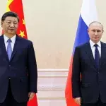 Chinese President Xi Jinping, left, and Russian President Vladimir Putin pose for a photo on the sidelines of the Shanghai Cooperation Organization (SCO) summit in Samarkand, Uzbekistan, Thursday, Sept. 15, 2022. (Alexandr Demyanchuk, Sputnik, Kremlin Pool Photo via AP)