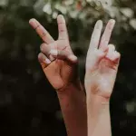 Here's the shocking reason why you should never make the 'peace' sign in photos