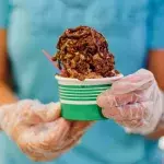 Ice cream held with surgical gloves