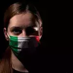 Woman with Italian colors mask
