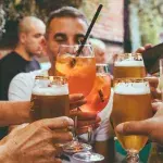 How does drinking alcohol during the day affect you differently than at night?