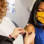 Woman getting vaccine