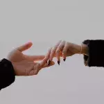 Couple holding hands
