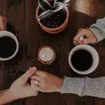 Couple holding hands