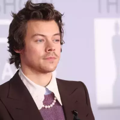 Harry Styles sporting black ribbon at the Brit Awards 2020