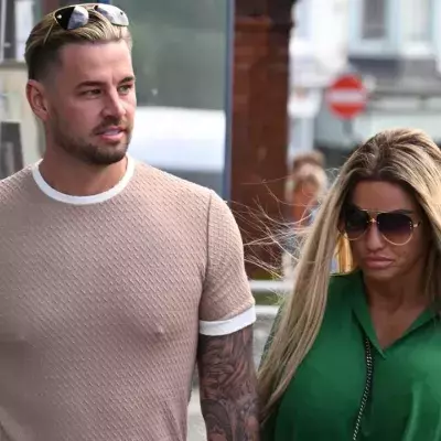 Katie Price flashes her engagement ring on a romantic getaway with Carl Woods