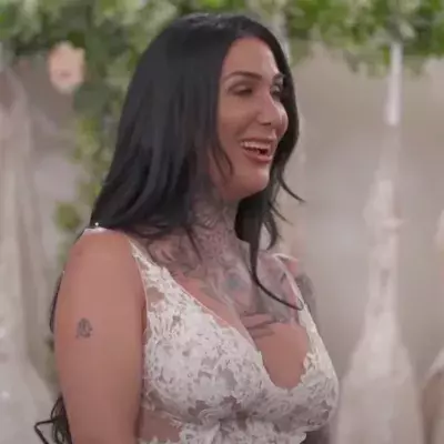 Mel loves her lacy gown.