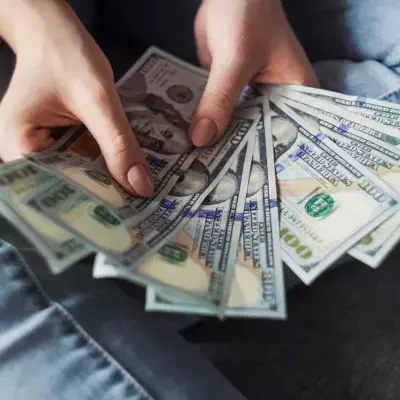 man hides banknotes town surprise treasure hunt